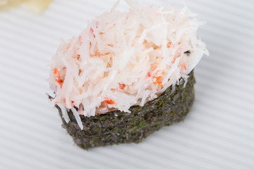 Gunkan stuffed with snow crab meat.