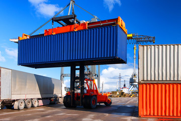 Obraz na płótnie Canvas Loading and unloading of containers in the port