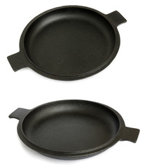 Set of black iron frying pan isolated on white background