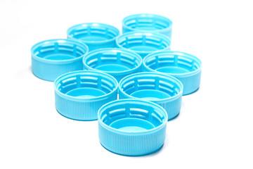 Light blue plastic bottle caps