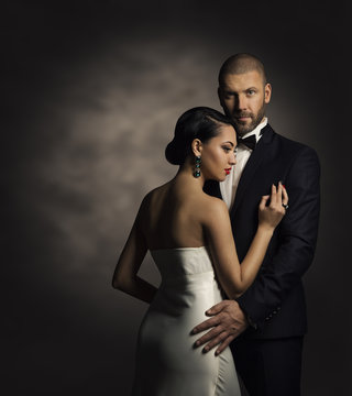 Couple in Black Suit and White Dress, Rich Man and Fashion Woman