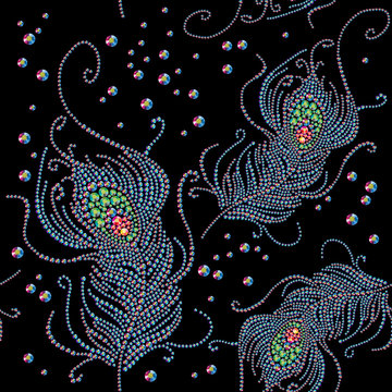 Abstract seamless pattern with splattered feathers on black backdrop made with rhinestones gems