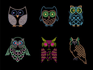 Obraz premium Collection of different owl characters made with colorful rhinestones on black background.