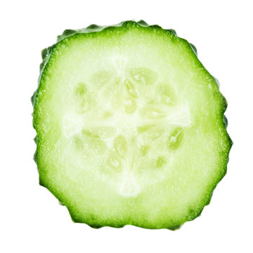 Slice of cucumber isolated on white..