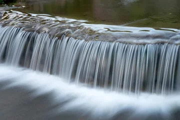Foto op Plexiglas white waterfall from small river © sabthai