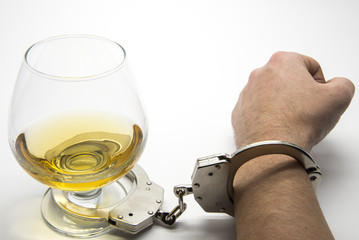 Alcohol and handcuffs