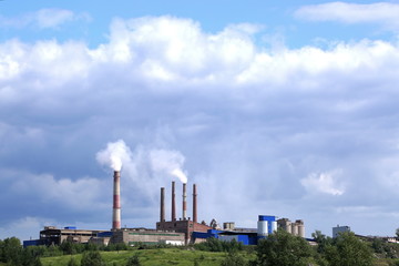 a factory or a plant on the mountain.