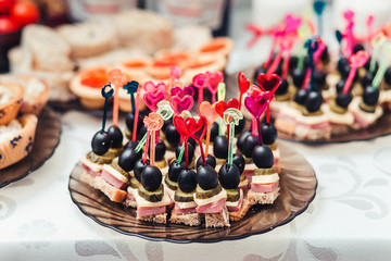Canapes on plate buffet closeup.