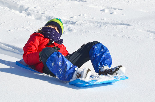 Kind beim Bobfahren, Wintersport