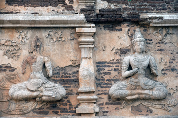 Fototapeta na wymiar Thai art on The Chedi of Wat Chet Yot temple in Chaingmai,Thailand.