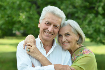 mature couple   in summer park