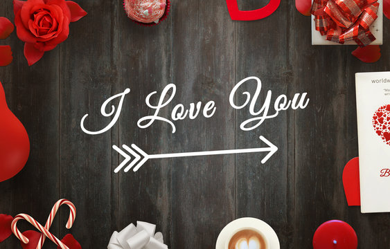 I love you scene with gifts, hearts, petals, rose, lollipop, coffee, book, balloon, tablecloth on wooden table.