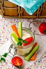 cheese dip with fresh vegetables for picnic