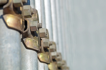 Details of a clamp for scaffolding in perspective with blur