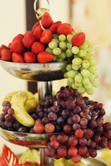 Naklejka na ściany i meble Tasty and delicious healthy fruit table grapes, apples and red s