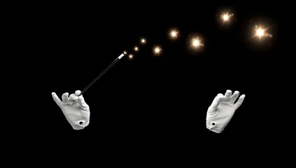 Foto op Plexiglas magician hands with magic wand showing trick © Syda Productions