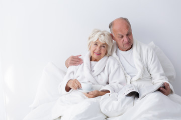 Senior marriage lying in bed