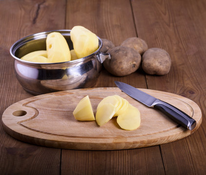 Sliced potatoes - preparing homemade chips