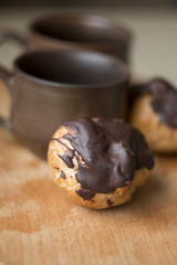 eclair with cup of coffee