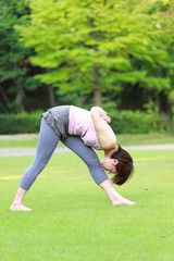 Japanese Woman Doing YOGA "Intense Side Stretch Pose"