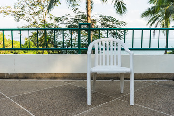 white plastic chair at terrace