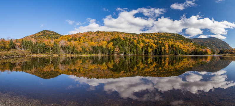 Colorful Autumn Landscape And Reflection In New Hampshire