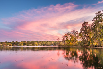 Dramatic Autumn sunset at Hamilton Lake in Arkansas - obrazy, fototapety, plakaty