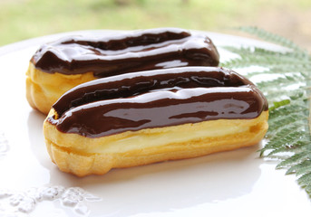 Cake eclair, decorated chocolate