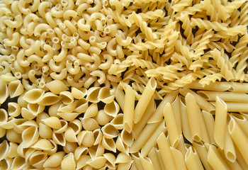 raw pasta on a dark background 