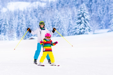 Kids skiing in the mountains