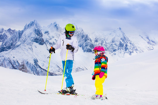 Kids skiing in the mountains