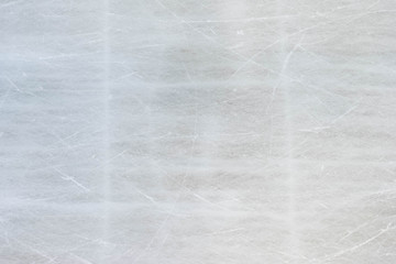 Background texture of ice skating rink with scratches