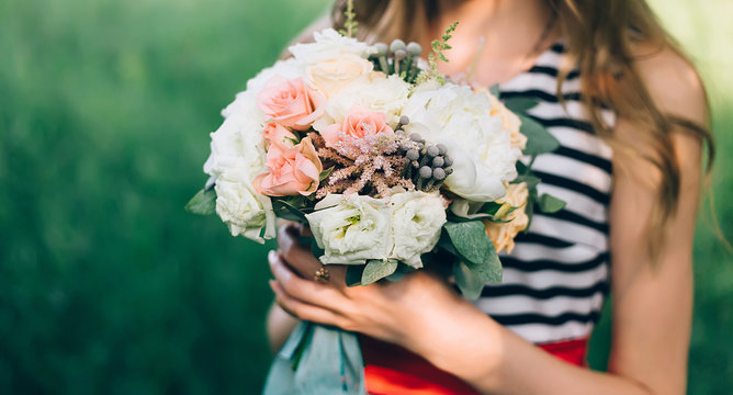 The Bride Holding A Bouquet