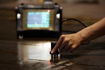Steel plate inspection by ultrasonic test for found internal defect