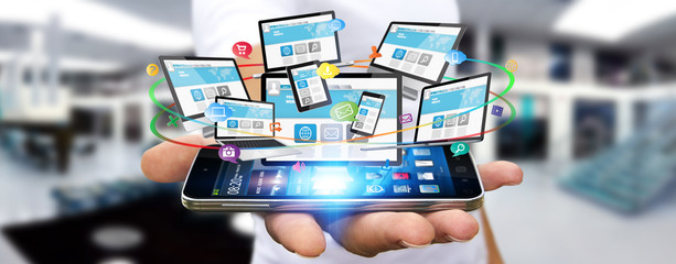 Businessman connecting tech devices