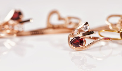 gold ring is gracefully curved shape ruby