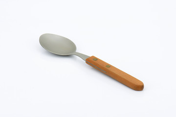 empty spoon with wooden handle