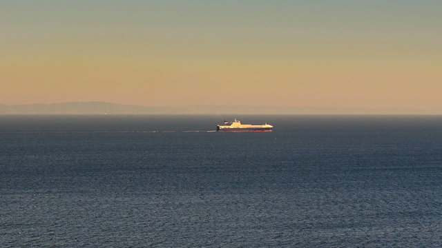 Fast motion of a ferry boat travelling. View from Sounio in Greece.