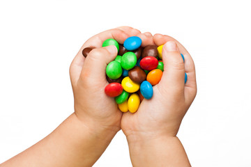 children's hands with candy