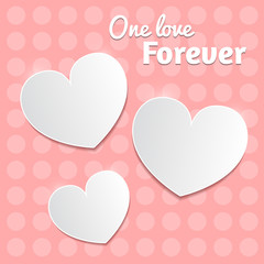White paper hearts Valentines day card on pink dotted background