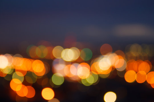 Blurred unfocuses abstract background city lights at night