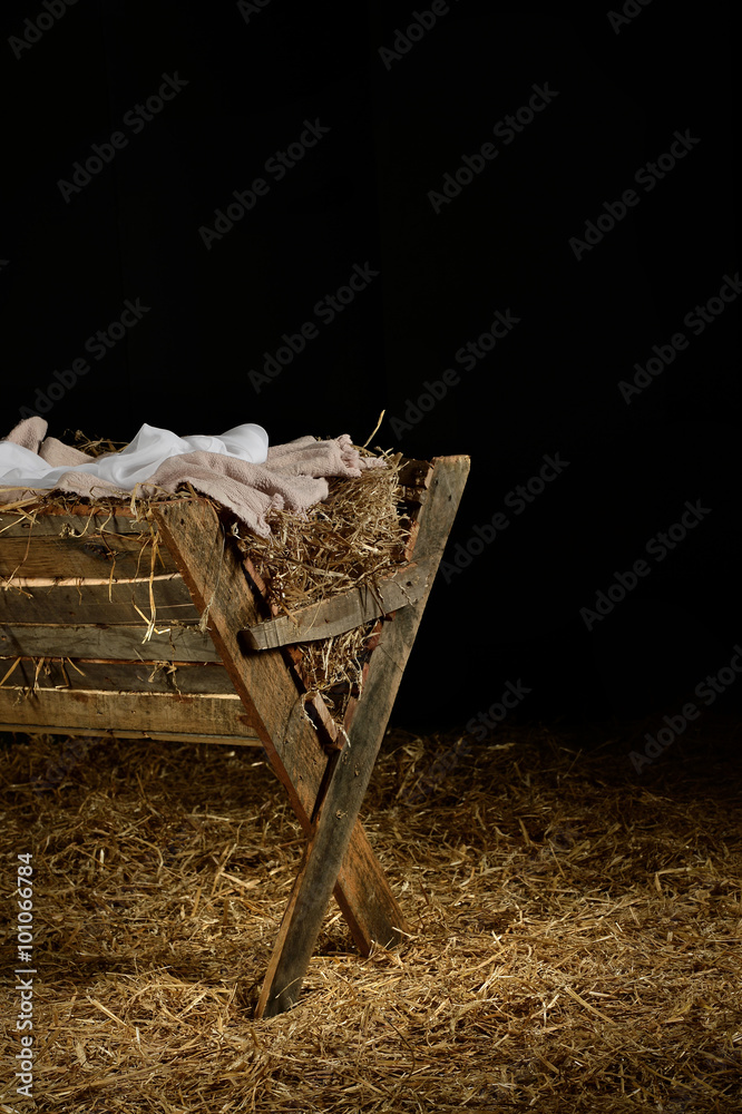 Wall mural Manger with Clothes on Hay