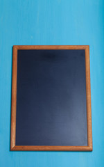 New blue wooden texture with chalk board for background. Toned