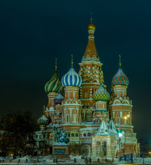Fototapeta na wymiar Cathedral of St. Basil covered in snow at night