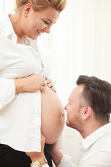 Obraz na płótnie Canvas Family expecting baby