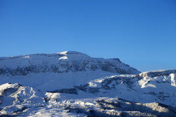 Obraz na płótnie Canvas Winter mountains at nice sun morning