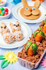 Easter background with sweets and juice for kids