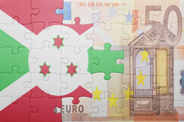 puzzle with the national flag of burundi and euro banknote
