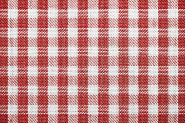 Table in red tablecloth background