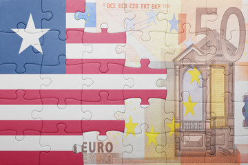 puzzle with the national flag of liberia and euro banknote